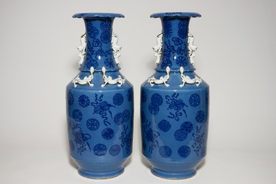 A pair of tall Chinese lavender blue ground vases with auspicious symbols, 19th C.
