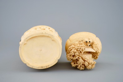 A very fine Chinese carved ivory vase and cover with figures in a landscape, ca. 1900