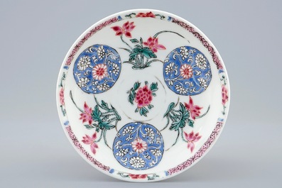A Chinese famille rose semi-eggshell cup and saucer with floral design, Yongzheng/Qianlong