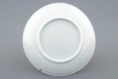 Une tasse et soucoupe en porcelaine de Chine famille rose &agrave; d&eacute;cor armoiri&eacute;, Yongzheng/Qianlong