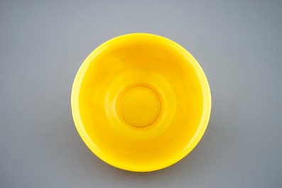 A Chinese carved yellow Beijing glass bowl, 19th C.