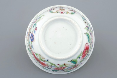 A Chinese famille rose armorial cup and saucer for the Dutch market, Yongzheng/Qianlong