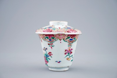 A Chinese famille rose hexagonal covered cup and saucer, Qianlong, 18th C.