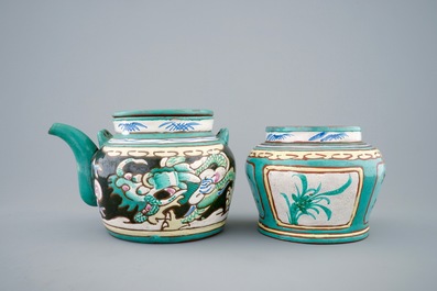 A Chinese enamelled Yixing teapot and cover with a small storage jar, 19th C.