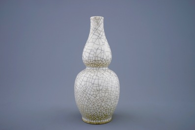 A Chinese monochrome crackle glazed double gourd vase, 19th C.