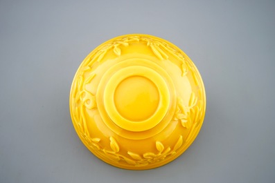 A Chinese carved yellow Beijing glass bowl, 19th C.