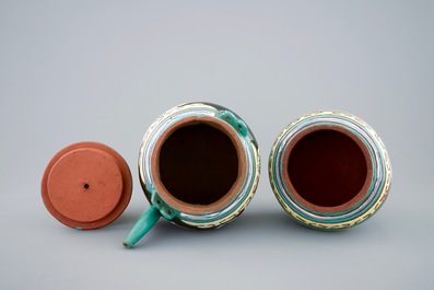 A Chinese enamelled Yixing teapot and cover with a small storage jar, 19th C.