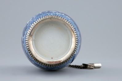 A blue and white barrel shaped Chinese silver mounted gin flask, Kangxi