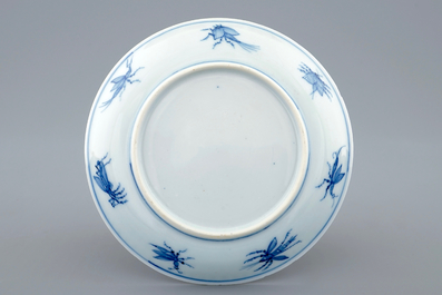 Une tasse et soucoupe en porcelaine de Chine bleu et blanc &agrave; &quot;La Dame au Parasol&quot; d'apr&egrave;s Pronk, vers 1740