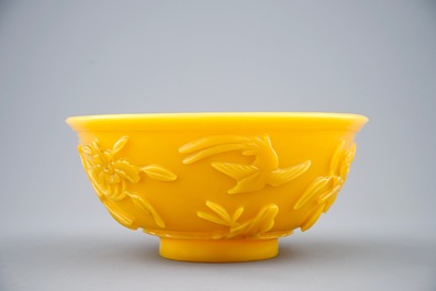 A Chinese carved yellow Beijing glass bowl, 19th C.