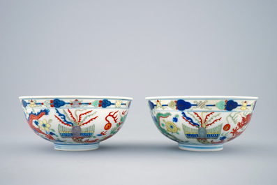 A pair of Chinese wucai dragon and phoenix bowls, Guangxu mark and of the period