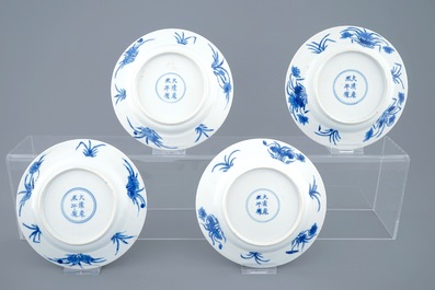 A set of 4 Chinese blue and white plates with fish, Kangxi mark and of the period