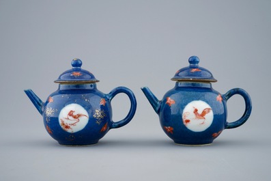 A pair of small Chinese powder blue teapots with roosters, Kangxi