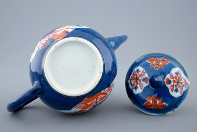 A Chinese powder blue and iron red decorated teapot and cover, Kangxi