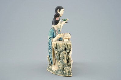 A Chinese polychrome carved ivory group of a lady with children, 19/20th C.