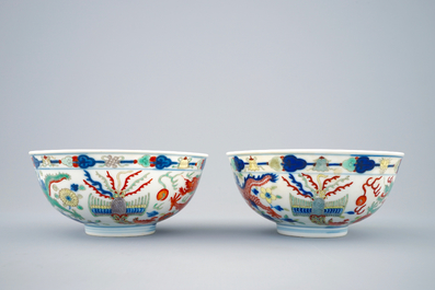 A pair of Chinese wucai dragon and phoenix bowls, Guangxu mark and of the period