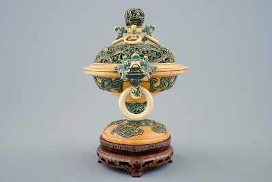 A Chinese polychrome ivory censer with cover on wooden base, 19th C.