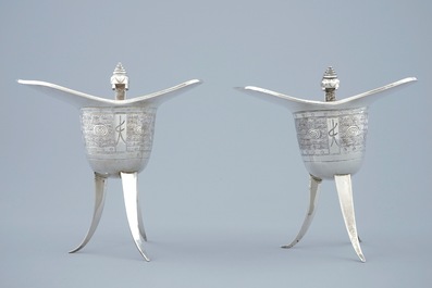 A pair of Chinese silver archaic &quot;Jue&quot; wine cups marked for Heng Li, Tientsin, 19th C.