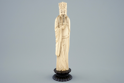 A Chinese carved ivory figure of a sage with a beaker on a lotus-shaped base, 19th C.