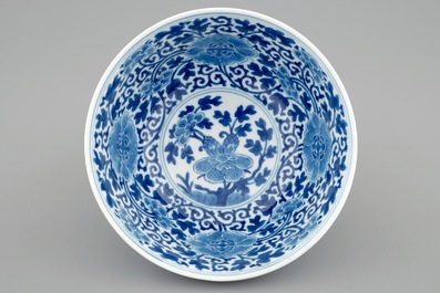 A Chinese blue and white peony scroll bowl, Qianlong mark and of the period