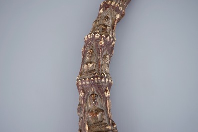 A carved and lacquered ivory tusk with Buddhas, Burma, 17/18th C.