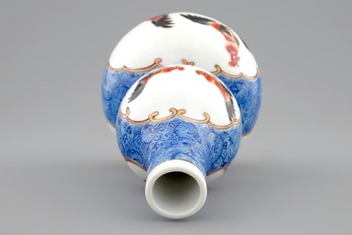 A Chinese blue ground double gourd vase with roosters, 18/19th C.