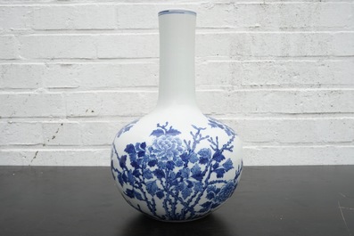 A Chinese blue and white bottle-shaped vase of floral design, 20th C.