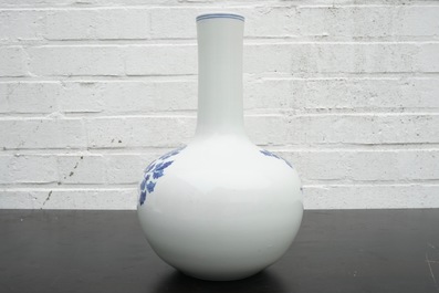A Chinese blue and white bottle-shaped vase of floral design, 20th C.