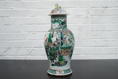 A Chinese famille verte vase and cover with a court scene, 19th C.