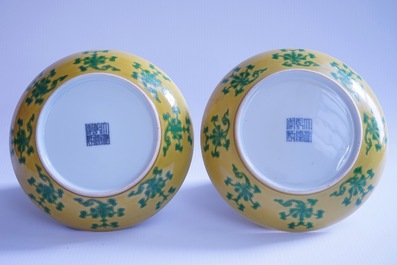 A pair of Chinese yellow glazed saucer dishes with incised backs, Qianlong sealmark and poss. of the period