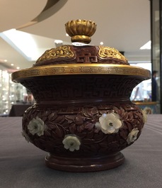 An unusual round Chinese lacquer box and cover with jade inset, 19/20th C.