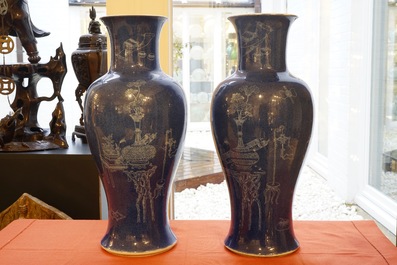 A pair of Chinese powder blue ground vases with incised decoration, 19th C.