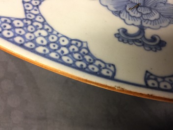 A massive blue and white Chinese charger with a punishment scene, Yongzheng/Qianlong