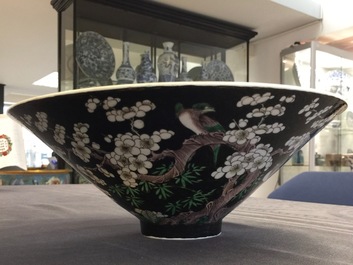 An unusual conical Chinese famille noire bowl, 19th C.