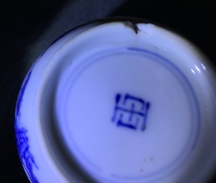 A blue and white Chinese cup and saucer with &quot;The crucifixion&quot;, Kangxi