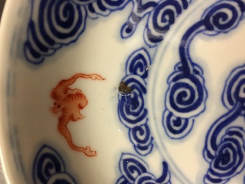 A pair of Chinese blue, white and iron red plates with bats among clouds, Guangxu mark and of the period