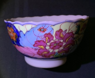 A set of 5 Chinese famille rose cups and 3 saucers with &ldquo;tobacco leaf&rdquo; design, Qianlong, 18th C.