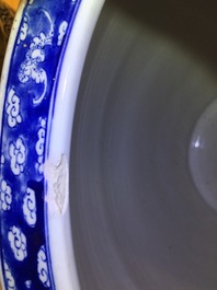 A large Chinese blue and white fish bowl with a view of Canton, 19th C.