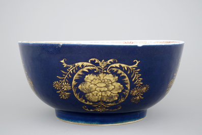 A large Chinese blue ground bowl with gilt decorations, 18th C.