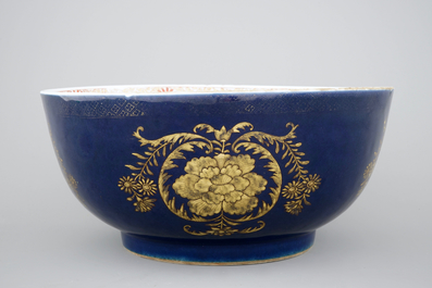 A large Chinese blue ground bowl with gilt decorations, 18th C.