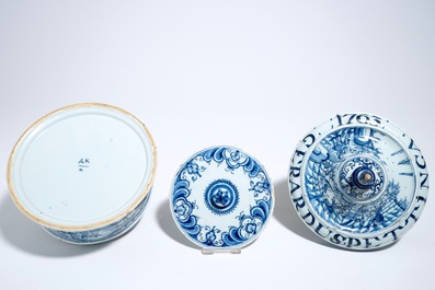 A Dutch Delft blue and white tobacco box and cover with tamper, dated 1763