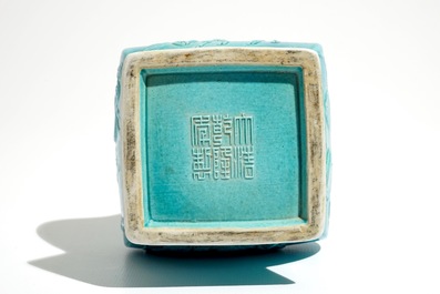 A Chinese turquoise glazed fanghu vase with applied slip design of animals, 19/20th C.