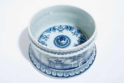 A Dutch Delft blue and white tobacco box and cover with tamper, dated 1763