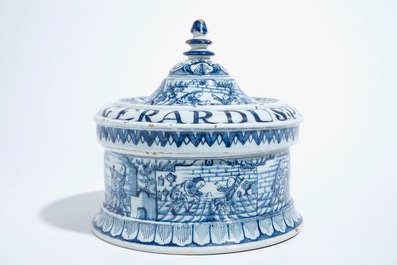 A Dutch Delft blue and white tobacco box and cover with tamper, dated 1763