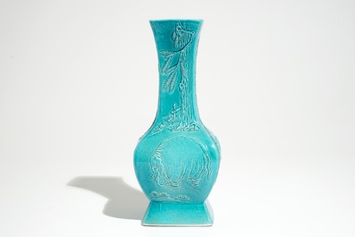 A Chinese turquoise glazed fanghu vase with applied slip design of animals, 19/20th C.