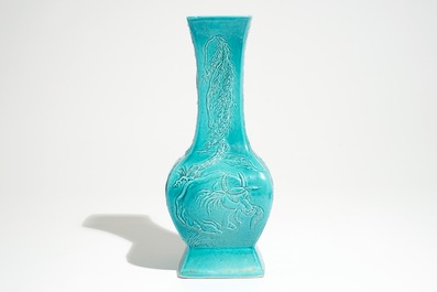 A Chinese turquoise glazed fanghu vase with applied slip design of animals, 19/20th C.