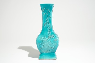 A Chinese turquoise glazed fanghu vase with applied slip design of animals, 19/20th C.