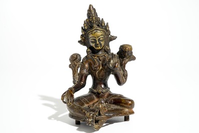 A Sino-Tibetan gilt bronze figure of Green Tara (Syamatara), 17/18th C.