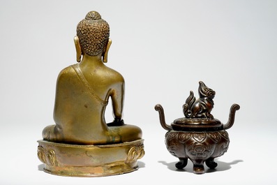A Chinese gilt bronze Buddha and a small bronze censer with cover, 19th C.