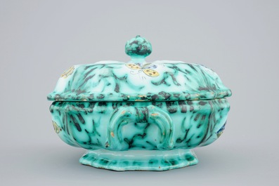 A Brussels faience tureen and cover on stand with butterflies and caterpillars, 18th C.